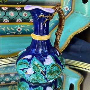 Hand-Painted Blue Ceramic Pitcher with Floral Design
